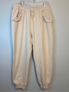 Ruffle-Pocket Joggers in Light Cream with ruffle heart back pockets
